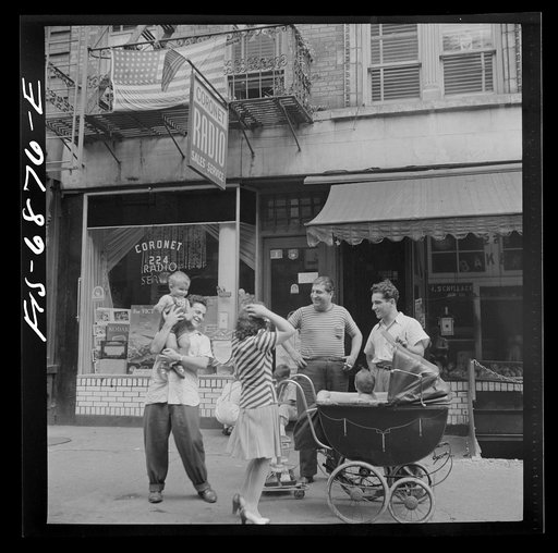 New York, New York. Italian-Americans on [Thompson] Street relaxing on Sunday