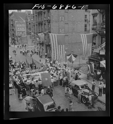 Untitled photo, possibly related to: New York, New York. Parade of Italian-Americans on Mott Street at a flag raising ceremony in honor of neighborhood boys in the United States Army