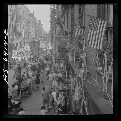 Untitled photo, possibly related to: New York, New York. Flag raising ceremony in the rain in honor of Mott Street boys in the United States Army