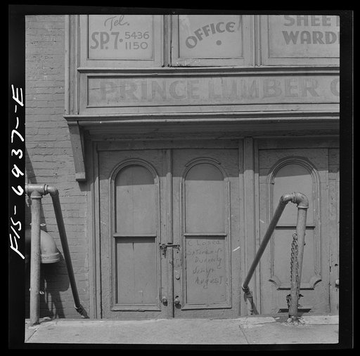New York, New York. Lumber shop on East Houston Street on Sunday