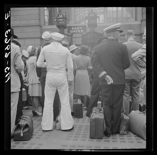 Untitled photo, possibly related to: New York, New York. Waiting for trains at the Pennsylvania railroad station