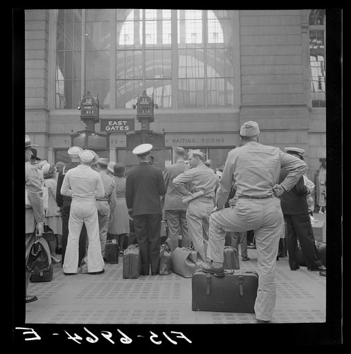 New York, New York. Waiting for trains at the Pennsylvania railroad station