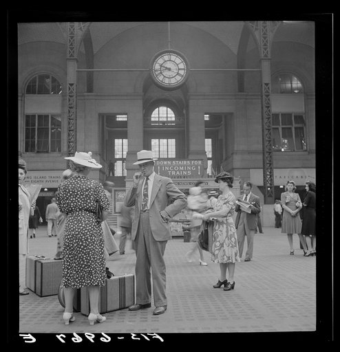 Untitled photo, possibly related to: New York, New York. Waiting for trains at the Pennsylvania railroad station