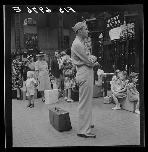 New York, New York. Waiting for trains at the Pennsylvania railroad station