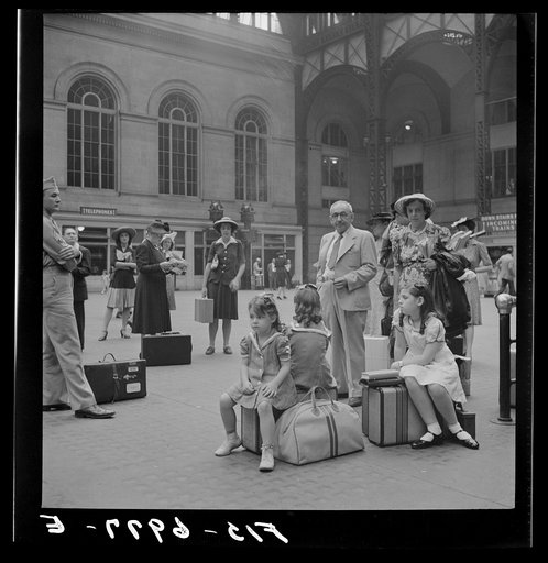New York, New York. Waiting for trains at the Pennsylvania railroad station