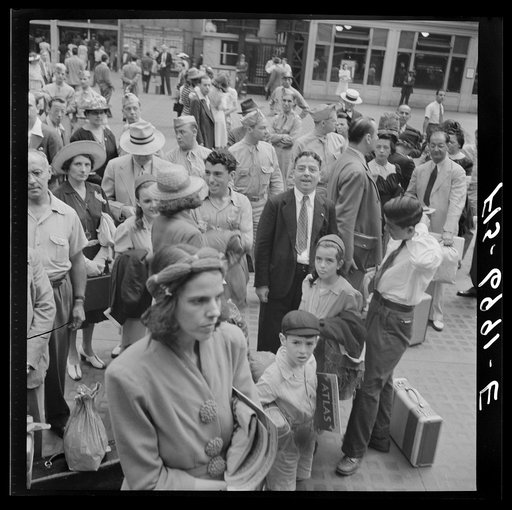 Untitled photo, possibly related to: New York, New York. Waiting for trains at the Pennsylvania railroad station