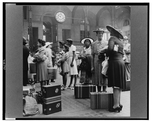 New York, New York. Waiting for the trains at the Pennsylvania railroad station