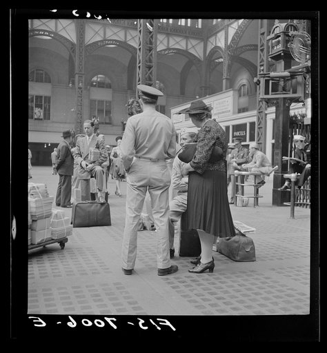 Untitled photo, possibly related to: New York, New York. Waiting for trains at the Pennsylvania railroad station