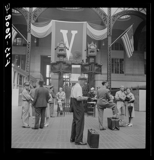 New York, New York. Waiting for trains at the Pennsylvania railroad station