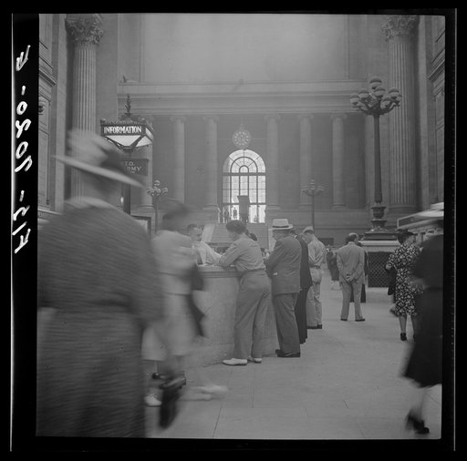 Untitled photo, possibly related to: New York, New York. Information booth at the Pennsylvania railroad station
