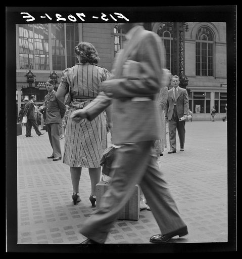 Untitled photo, possibly related to: New York, New York. Waiting for the trains at the Pennsylvania railroad station