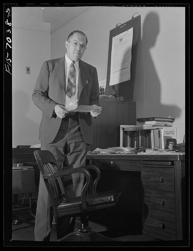 Washington, D.C. Dr. John Lund (Norwegian), senior specialist in the education of school administrators, U.S. Office of Education, and acting executive director, Wartime Commission, U.S. Office of Education