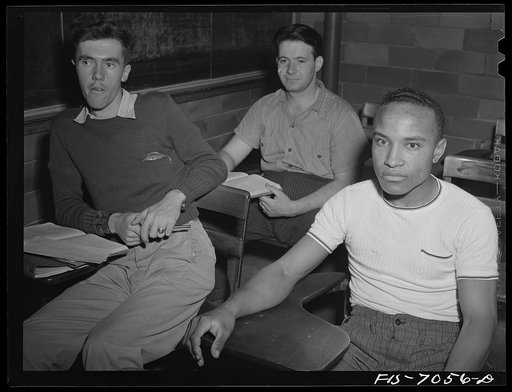 Untitled photo, possibly related to: Detroit, Michigan. Class in fundamentals of radio under the defense training program sponsored by the United States government at the University of Detroit. Most of the students are already employed in war plants