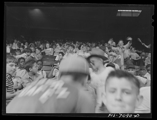 Untitled photo, possibly related to: Detroit, Michigan. Kids at a ball game at Briggs Stadium