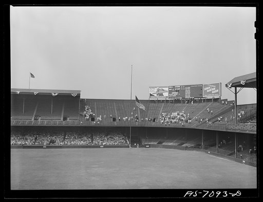Detroit, Michigan. Raising the flag at the start of the ball game at Briggs Stadium