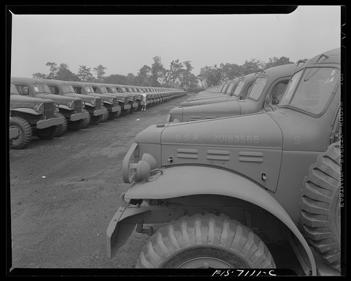Chrysler Corporation. Dodge truck plant. Detroit, Michigan (vicinity). These long rows of Dodge Army trucks await shipment to various branches of the armed forces. Hundreds of army vehicles come off the Chrysler Corporation production lines daily