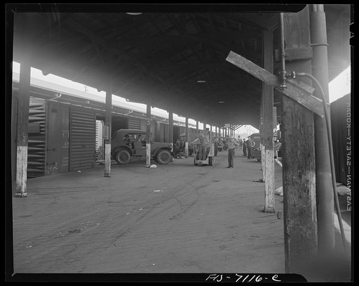 Chrysler Corporation. Dodge truck plant. Detroit, Michigan (vicinity). Loading Dodge Army trucks on freight cars