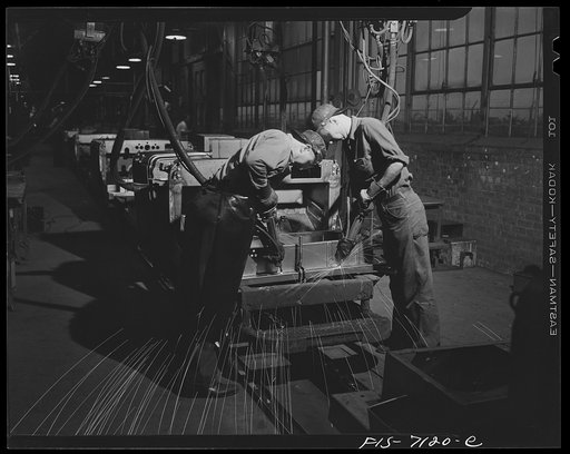 Detroit, Michigan (vicinity). Chrysler Corportation Dodge truck plant. Spot-welding saves manufacturing time and increases the strength of many important parts of Dodge Army trucks