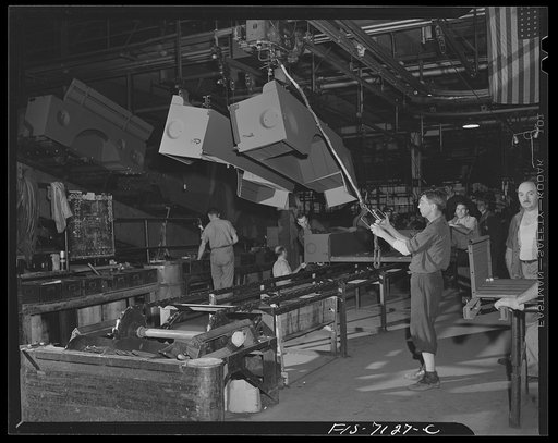 Detroit, Michigan (vicinity). Chrysler Corporation Dodge truck plant. Heavy side members of Dodge Army trucks and other large parts are quickly handled by overhead cranes