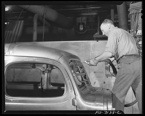Detroit, Michigan (vicinity). Chrysler Corporation Dodge truck plant. Drilling and bolting operations on the bodies of Dodge Army trucks are all done by rapid and accurate automatic tools