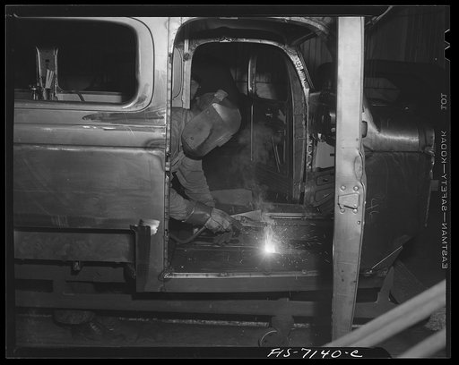 Detroit, Michigan (vicinity). Chrysler Corporation Dodge truck plant. Welding floor sections of Dodge Army trucks