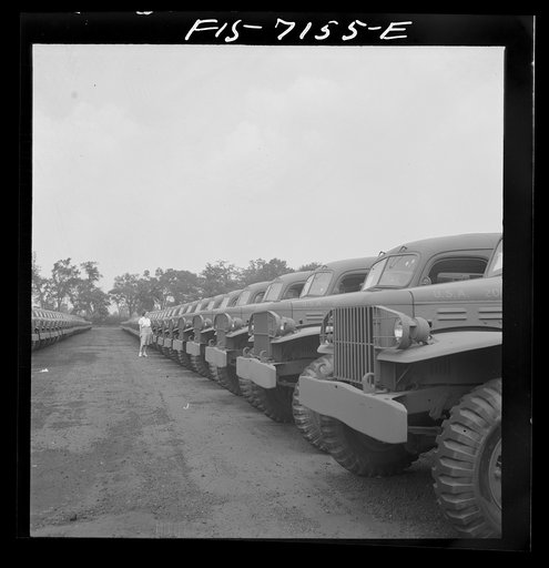 Detroit, Michigan (vicinity). Chrysler Corporation Dodge truck plant. Dodge Army vehicles are lined up to be driven away for service with various branches of the armed forces