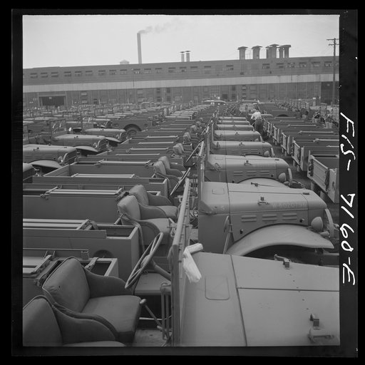 Detroit, Michigan (vicinity). Chryler Corporation Dodge truck plant. Side by side and end to end, hundreds of Dodge Army trucks, produced daily, stand in the yards waiting for the final touches that make them effective fighting vehicles