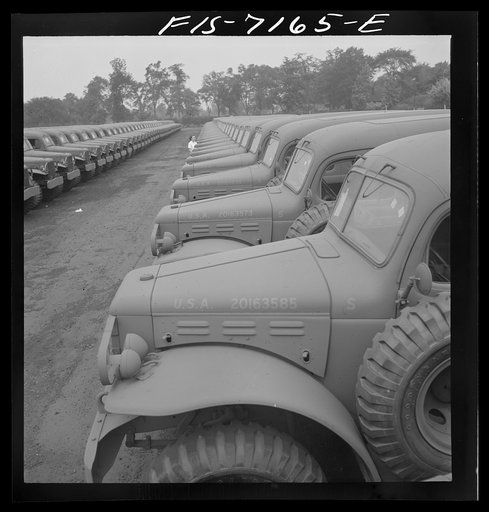 Untitled photo, possibly related to: Detroit, Michigan (vicinity). Chrysler Corporation Dodge truck plant. Dodge Army vehicles are lined up to be driven away for service with various branches of the armed forces