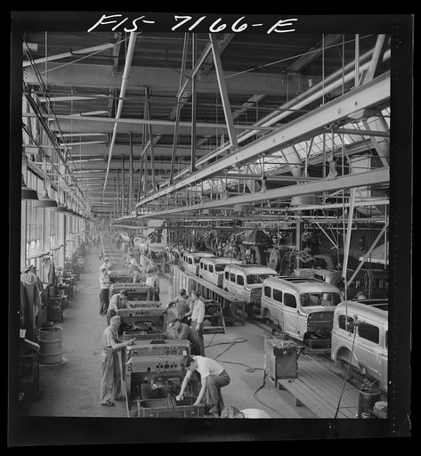 Detroit, Michigan (vicinity). Chrysler Corporation Dodge truck plant. A steady stream of bodies for Dodge Army trucks receive important finishing operations along this section of the production line