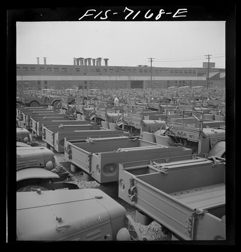 Detroit, Michigan (vicinity). Chrysler Corporation Dodge truck plant. Side by side and end to end, hundreds of Dodge Army trucks, produced daily, stand in the yards waiting for the final touches that make them effective fighting vehicles