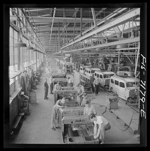 Untitled photo, possibly related to: Detroit, Michigan (vicinity). Chrysler Corporation Dodge truck plant. Hundreds of deft operations are required to assemble and finish the long lines of Dodge Army truck bodies that move daily to final production lines