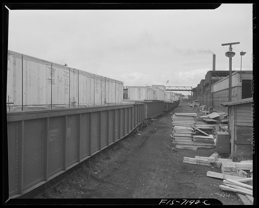 Detroit, Michigan (vicinity). Chrysler Corporation Dodge truck plant. Loaded freight cars leaving the plant
