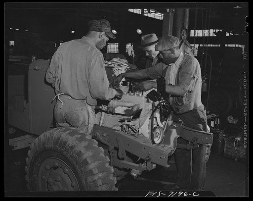 Dodge truck plant, Detroit, Michigan. Taking apart engine assembly for export