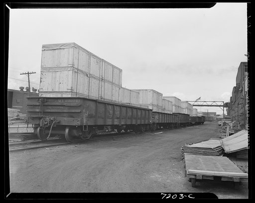 Detroit, Michigan (vicinity). Chrysler Corporation Dodge truck plant. Partly loaded freight car showing method of transportation