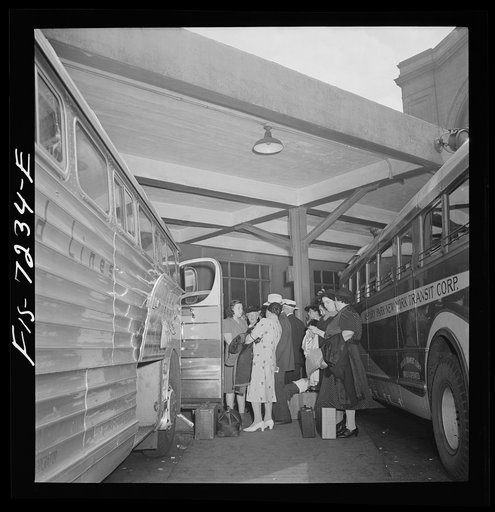 Untitled photo, possibly related to: New York, New York. Boarding interstate buses at the Greyhound bus terminal, 34th Street