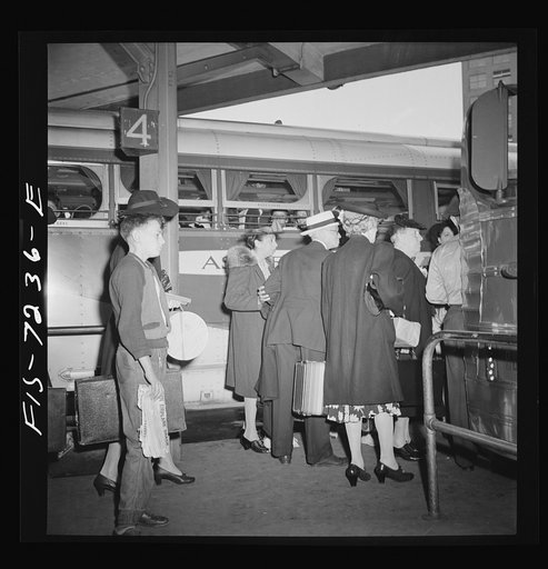 Untitled photo, possibly related to: New York, New York. Boarding interstate buses at the Greyhound bus terminal, 34th Street
