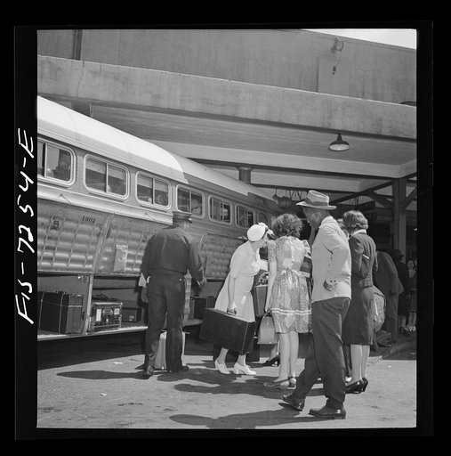 Untitled photo, possibly related to: New York, New York. Boarding interstate buses at the Greyhound bus terminal, 34th Street