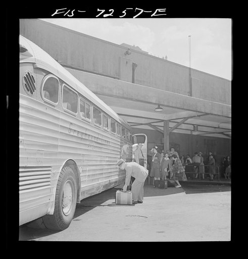 New York, New York. Boarding interstate buses at the Greyhound bus terminal, 34th Street
