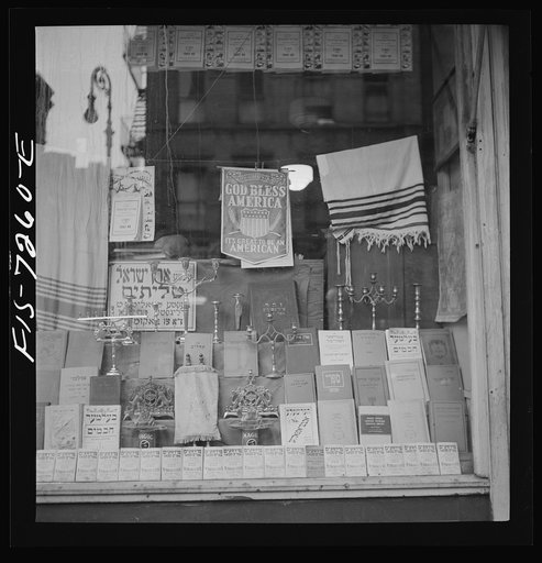 Untitled photo, possibly related to: New York, New York. Window of a Jewish religious shop on Broom Street