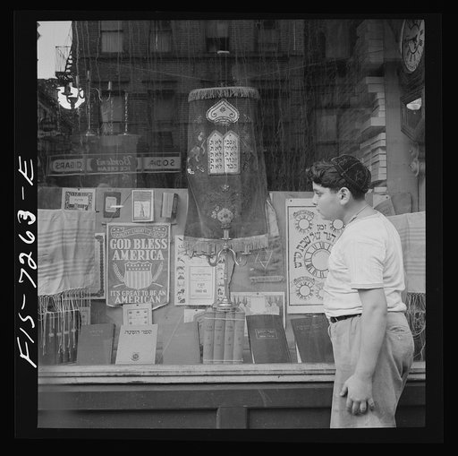 Untitled photo, possibly related to: New York, New York. Window of a Jewish religious shop on Broom Street
