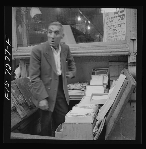 Untitled photo, possibly related to: New York, New York. Sidewalk merchant in the Jewish section