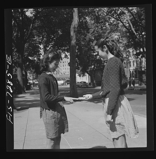 Untitled photo, possibly related to: New York, New York. Chinese-American girl playing hopscotch with American friends outside her home in Flatbush