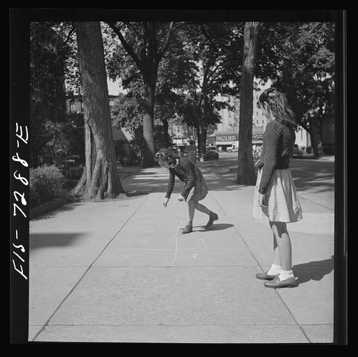 Untitled photo, possibly related to: New York, New York. Chinese-American girl playing hopscotch with American friends outside her home in Flatbush