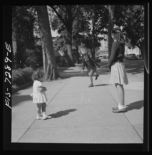 Untitled photo, possibly related to: New York, New York. Chinese-American girl playing hopscotch with American friends outside her home in Flatbush