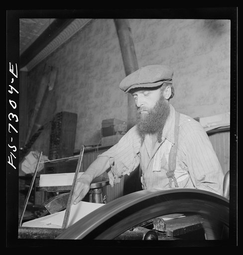 New York, New York. Jewish printer in a small shop on Broom Street