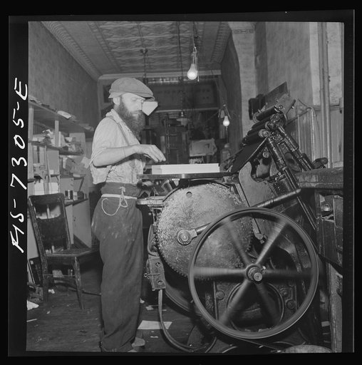 Untitled photo, possibly related to: New York, New York. Jewish printer in a small shop on Broom Street