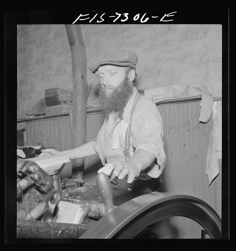 New York, New York. Jewish printer in a small shop on Broom Street