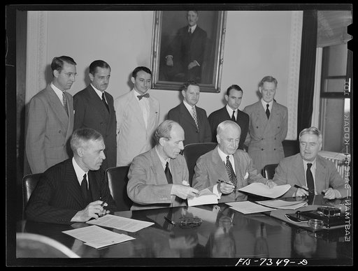 Washington, D.C. The Australian Minister, Lord Halifax, and the New Zealand Minister signing a lend-lease agreement