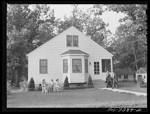 Cass Lake, near Pontiac, Michigan. The front of the Westerberg home, twenty-five miles from the Dearborn plant where Karl Westerberg went to work in 1924 as an employee of the Johansson gauge division of the Ford Motor Company. Mr. Karl Westerberg and his son Eric are arriving home after a day at th