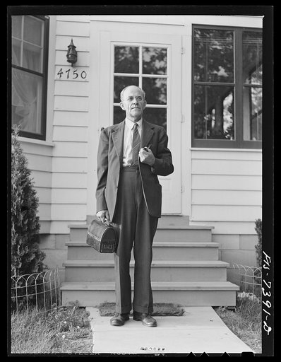 Cass Lake (vicinity), Pontiac, Michigan. Karl Axel Westerberg leaving his home with his lunch box for a day's work in the Ford Motor Company plant in Dearborn
